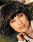 Wispy bob haircut with textured and beveled sides
