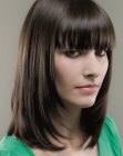 Face framing bob hairstyle with deep bangs