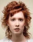 Red hair with diagonal barrel styled bangs