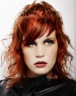 Red hair with varying lengths and diagonal bangs