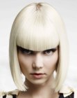 Sleek icy blonde hair cut into a bob