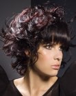 Layered medium length hairdo with sleek bangs