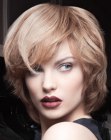 Versatile medium long haircut with volume