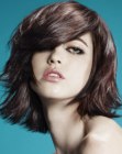 Tousled bob with bangs that plunge into the face