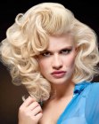 Blonde vintage hairstyle with large sculpted curls