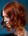Copper color hairstyle with a shorter back