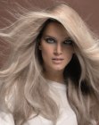 Mid back blonde hair with large layers