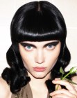 Black hair cut into a retro style with short bangs