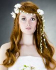 Wedding hair with accent braids and flowers