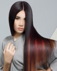 Sleek long hair with color streaks