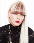 Platinum blonde hair with two tone bangs