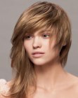Long asymmetrical hairstyle with an angle along the face