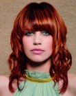 Long red hair with beautiful spiral curls
