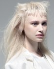 Long platinum blonde hair with flared out bangs