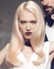 Curvy platinum blonde hair with pink streaks