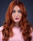 Long red hair with waves and a middle part