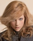 Free-spirited and purposely unruly hair with teased texture