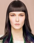 Long brown hair with green and purple strands