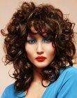 1980s inspired long hairstyle with large bouncing curls