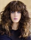 Effortless long hair with waves and thick bangs