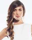 Long hairstyle with a loose side braid