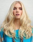 Hippie look with long blonde hair and curled ends