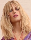 Beach look with long blonde layered hair