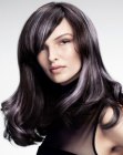 Long dark hair with silver streaks