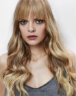 Long hair with waves and smooth bangs