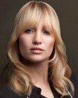 Long style with bangs for wavy hair