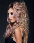 Hair with curls and pinned up into a half up-style