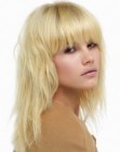 Long blonde shag with full bangs