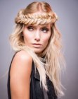 Long blonde hair with a fishtail braid