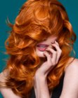 Bright copper red hair with flawless curls