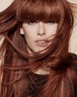Long glossy hair with solid bangs