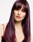 Sleek long hair with bangs and a dark purple color