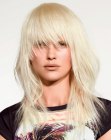 Long blonde hair with layers and wispy bangs