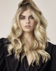 Long blonde hair with signature highlights