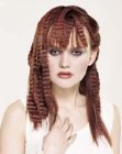 Long red hair with crimping and asymmetrical elements