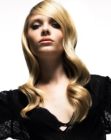 Long blonde hair with big spiral rod waves