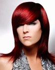 Long and straight red hair with rounded bangs