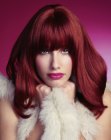 Long ruby red hair with fluffy volume