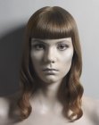 Hair with waves and full blunt cut bangs