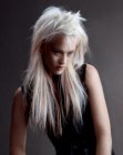 Long platinum blonde hair with darker streaks