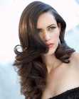 Long brown hair with large spiral curls