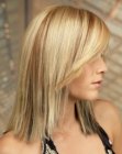 Long straight haircut with a smooth surface and a side part