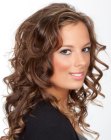 Long brunette hairstyle with corkscrew curls