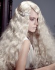 Very long platinum blonde hair with thick waves