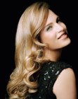 Romantic blonde hairstyle with softness and shine