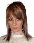 Soft layered hairstyle with razor-cut bangs